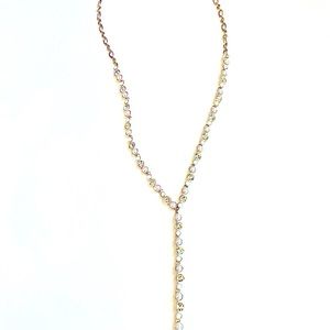 Francesca’s Long Gold Y shaped necklace. Rhinestones and pearls.